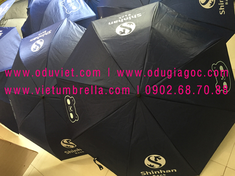 xưởng sản xuất ô dù cầm tay in logo quảng cáo